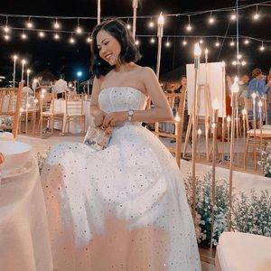 Wedding dress ( tulle fabric, lots of layers )